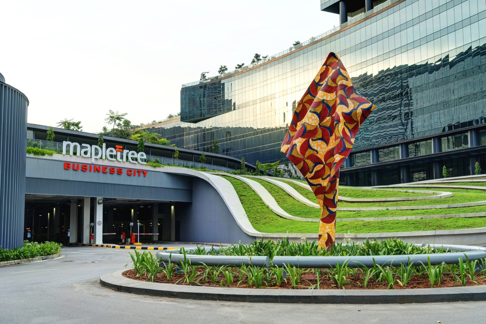 Yinka Shonibare CBE (RA), <em>Wind Sculpture I</em>, 2013, steel armature with hand painted fibreglass resin cast, Mapletree Business City II. Courtesy NTU CCA Singapore.