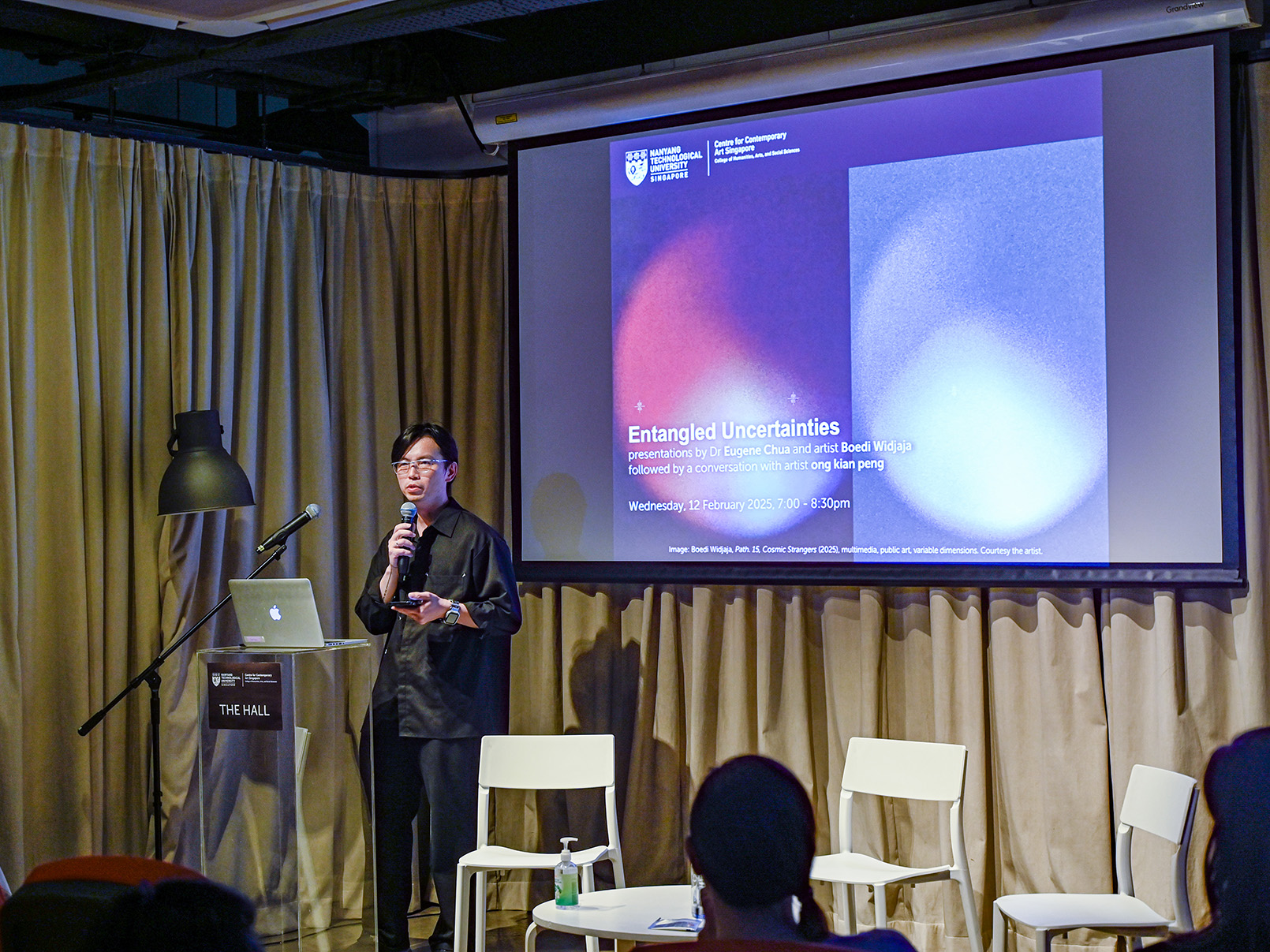 artist giving a lecture