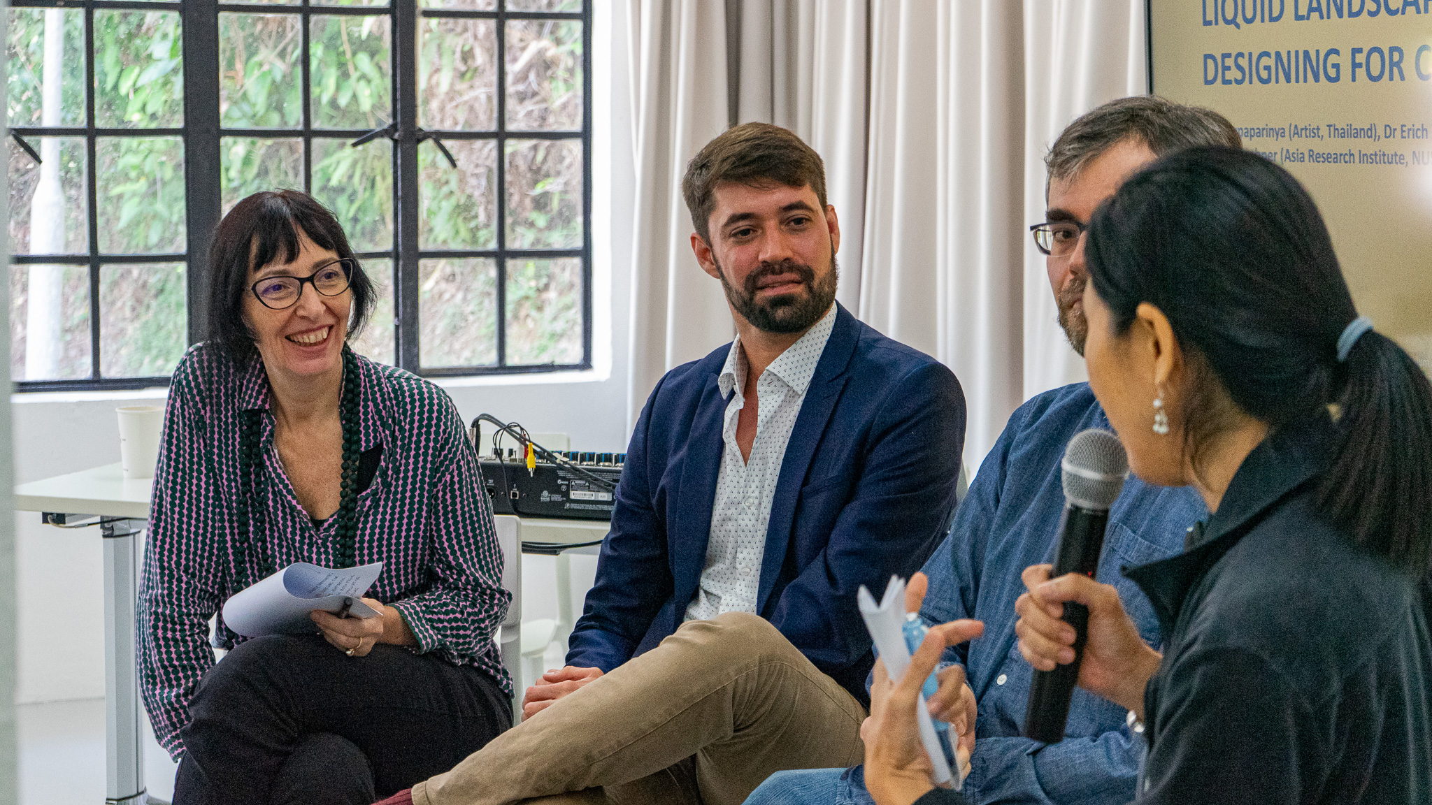 Seated people discussing